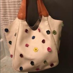 Soft leather flowered hand bag . Made in Italy